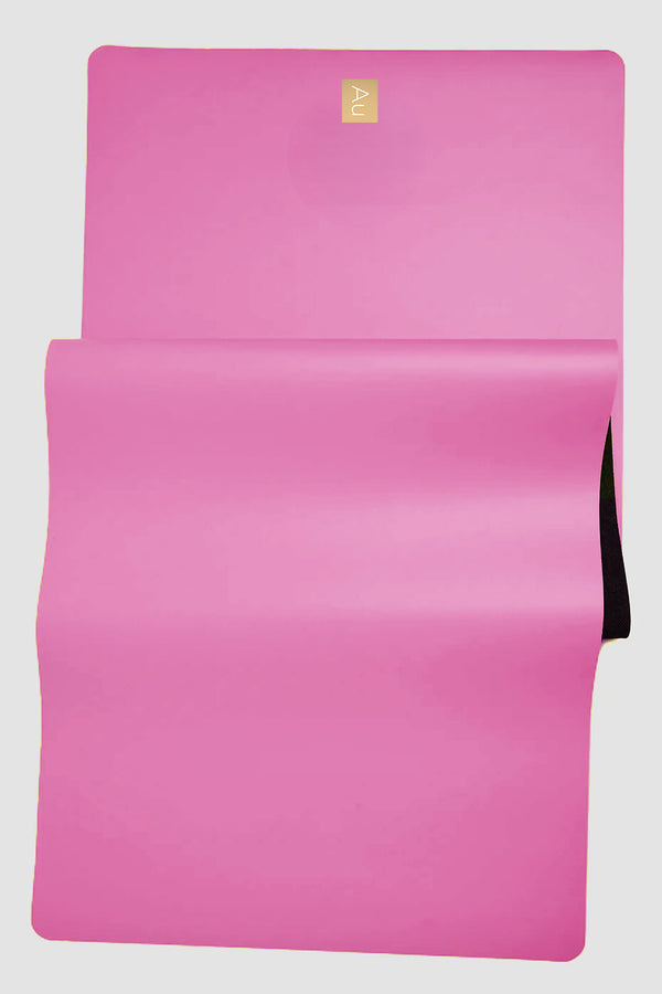 Aurum yoga mat with sling strap in raspberry pink/black